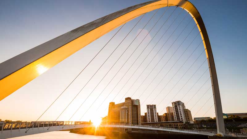 Newcastle city at sunset with golden sunlight