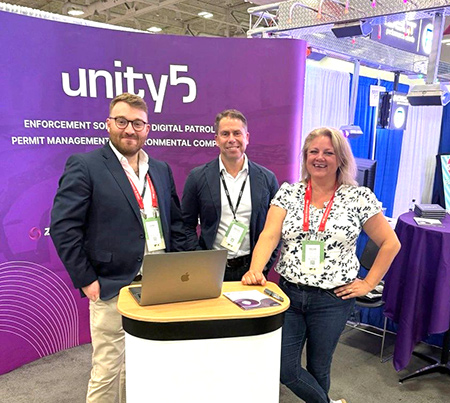 Unity5 team on stand at the IPMI 2025 conference